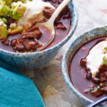 Beef and Black Bean Chili with Toasted Cumin Crema and Avocado Relish