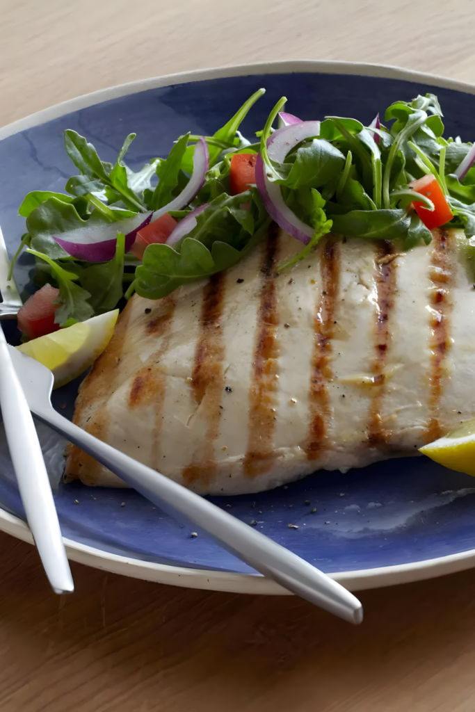 Grilled Chicken Paillard with Lemon and Black Pepper and Arugula-Tomato Salad