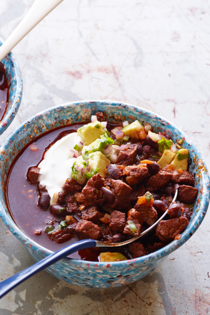 Beef and Black Bean Chili with Toasted Cumin Crema and Avocado Relish