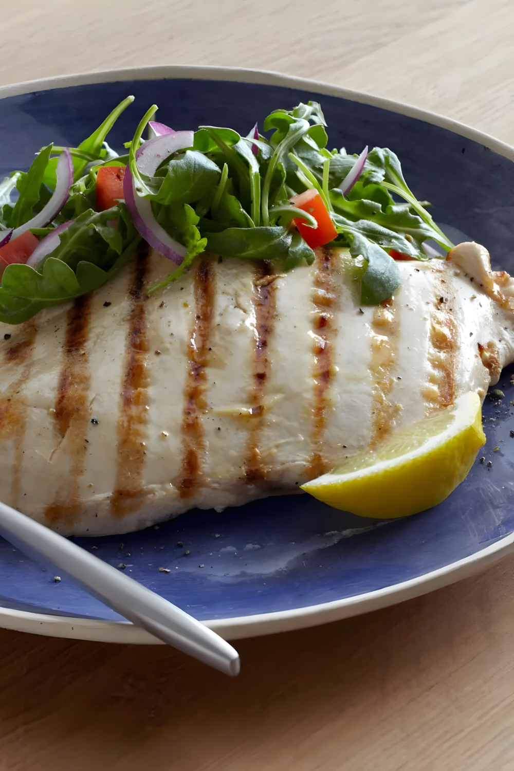 Grilled Chicken Paillard with Lemon and Black Pepper and Arugula-Tomato Salad