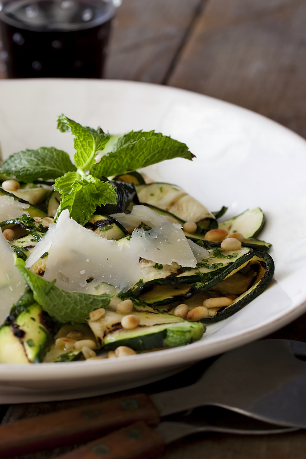 Grilled Zucchini Salad with Lemon-Herb Vinaigrette and Shaved Romano and Toasted Pine Nuts