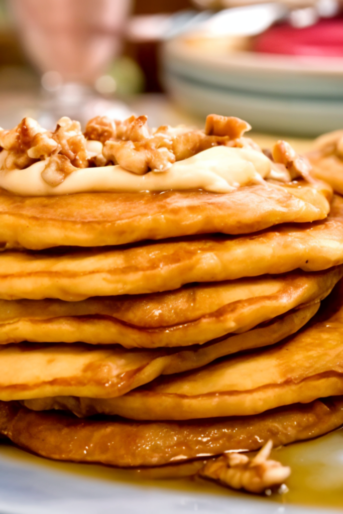 Carrot Cake Pancakes with Maple-Cream Cheese Drizzle and Toasted Pecans