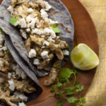 Shredded Chicken and Tomatillo Tacos with Queso Fresco