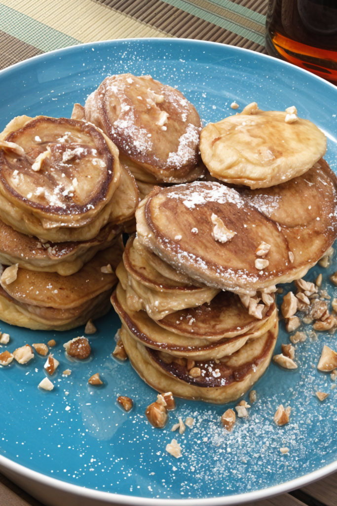 Silver Dollar Buttermilk-Pecan Pancakes with Bourbon Molasses Butter and Maple Syrup